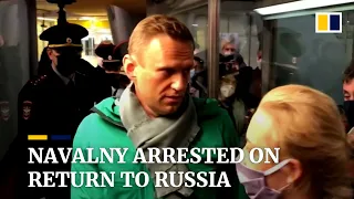 Kremlin critic Alexei Navalny arrested and detained upon return to Russia after near-fatal poisoning