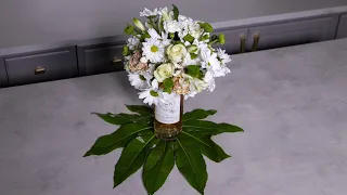 Floral Elegance: DIY Wine Bottle Accent with March Flowers 🌸🍷