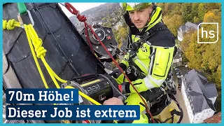 Unterwegs mit Industriekletterern am Marburger Kirchturm | hessenschau