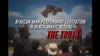 African man performing levitation in black magic ritual. THE TRUTH