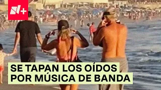 Turistas se tapan los oídos por la música de banda sinaloense en Mazatlán - N+