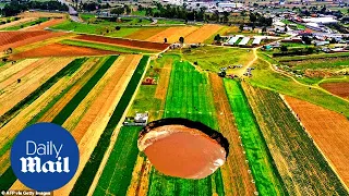 Mexico: Massive 60m wide sinkhole cracks open farmland in Puebla