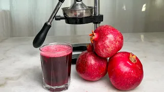 Fresh squeezed Pomegranate juice with a Hand Press