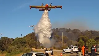 Canadair CL-415 Amphibious Aircraft Dumping Water