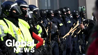 Trucker protests: Police in Ottawa clash with demonstrators in bid to end blockade