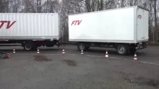 LKW Fahrschule, Grundfahraufgabe Gliederzug rückwärts um Kurve schieben