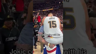 Jokic hugs his brother after Finals Win.