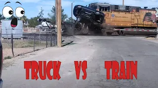 Train barrels through semi truck car hauler stuck on railroad tracks