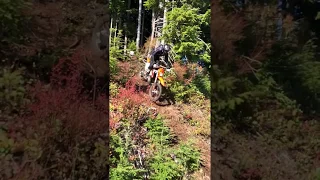 Dropping down a steep face on a 2018 KTM 300 XC-W