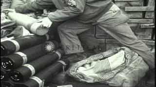 US 5th Army gun crew loads shells into a 105mm howitzer on an M7 motor carriage a...HD Stock Footage