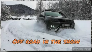 Mitsubishi Outlander lifted off road in the snow