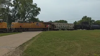 UP ethanol train with some KCS Power. rolling through slow.