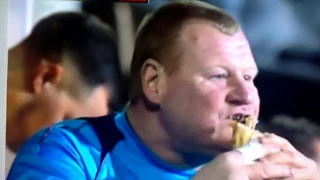Wayne Shaw, reserve goalkeeper for Sutton Utd, enjoys a pie,