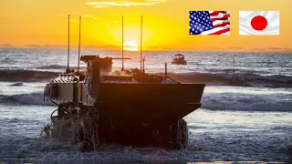 US Marine and Japan Amphibious Combat Vehicles  Drive Into The Sea During an Exercise