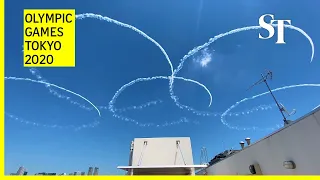 Watch Japan's Air Force paint the sky over Olympic park