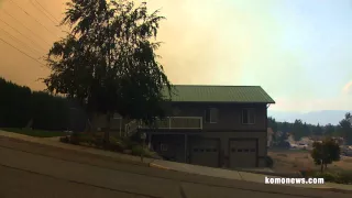 Chelan wildfire retardant drop from a DC-10 hits the camera.