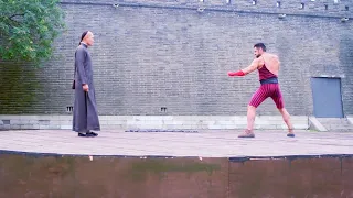 Russian strongman humiliated Chinese Kung Fu, but Chinese boy jumped onto the ring and defeated him