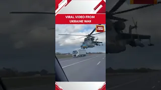 Video: An Attack Helicopter Barely Missing Cars On A Ukraine Highway | Russia-Ukraine War