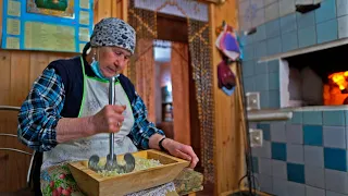BURANOVSKIE BABUSHKI prepare forgotten UDMURT dishes in a Russian wood oven. Buranovo, UDMURTIA.