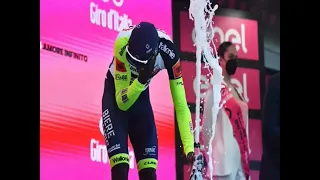 Biniam giray gets a champagne cork in the eye | giro d italia 2022