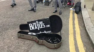 Buskers playing Ticket To Ride (The Beatles) in Hackney
