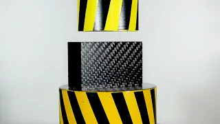 HYDRAULIC PRESS AGAINST CARBON FIBER, CARBON FIBER