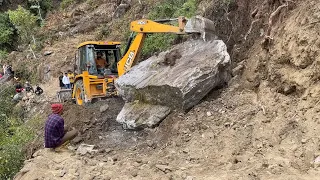 Massive Rock Could not Stop Rocky Mountain Road Construction