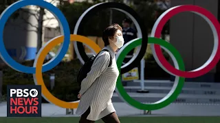 News Wrap: IOC member says Tokyo Olympics will be postponed