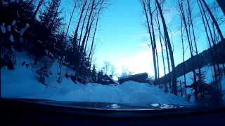 Mitsubishi Outlander S-AWC in deep snow on steep incline