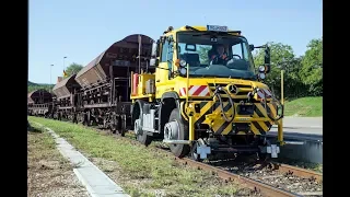 №2. Локомобиль Unimog U423. Маневровый. Навеска: пылесос вакуумный и автовышка.