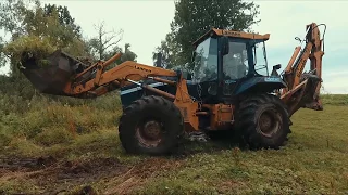 Обзор универсальный погрузчик экскаватор .Оскар сломал квадрик и стройка века .