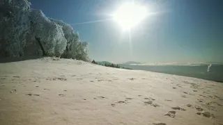 Crestline peak and Lake Gregory after snowstorm.