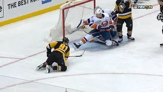 Scott Mayfield helps out Robin Lehner with clutch blocks