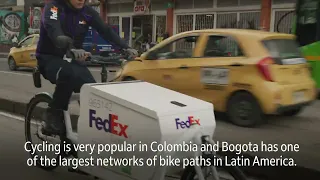 Riding an e-bike in Bogota with FedEx