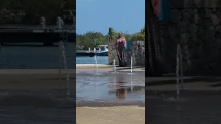 Caymen Islands boys loves Water fountain