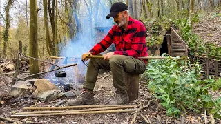 Rain Camp in a Hidden Shelter with a Fireplace in the Forest