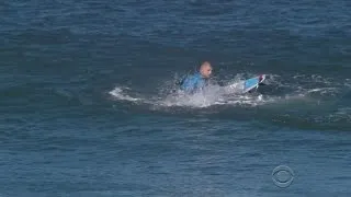 Pro surfer fights off shark during contest in South Africa