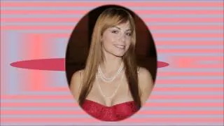 Erica Durance video slide show.     Patsy.