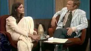 Margot Kidder reads a quote from Joan Garrity