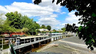 This is the Narrowboat PINNED TO WEIR on the River Avon