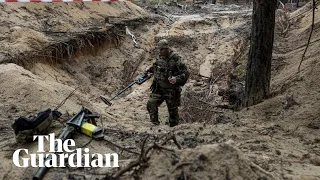 Ukraine says it has discovered mass burial site with 400 bodies in recaptured city