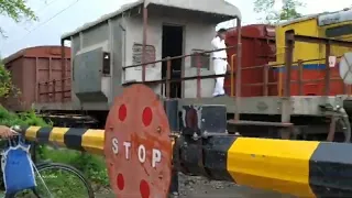 Train passing through a busy Rail Crossing/ Gate || Indian Railway