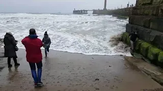 whitby wave surprise wet feet photographer the victim walk of shame