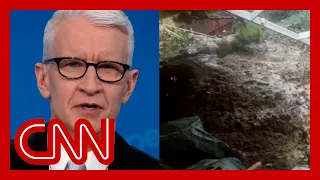 Anderson Cooper speaks with woman whose home was destroyed by towering mud piles