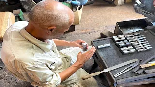 The process by which traditional Japanese hammers are made. 70-year-old Japanese hammersmith.