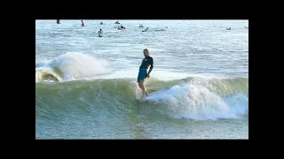 Isaac Wood rides his noserider at Nland Surf Park