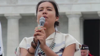 Lyla June Johnston prays for healing 'diseased' war makers, sings powerful song