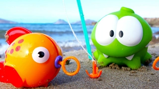 Om Nom. Toy's adventures - Toys on the beach. Videos for kids.