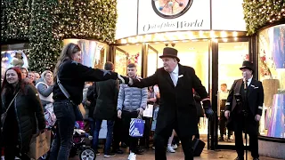 Wonderful Moment As Department Store Doormen Come Out And Get The Whole Street Dancing.