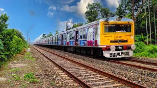 Yellow faced EMU local train arrival and departure